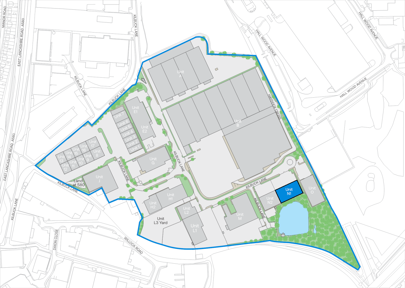 Site map showing multiple industrial units, internal roads, green areas, a pond, and surrounding streets, all outlined by a blue boundary line.