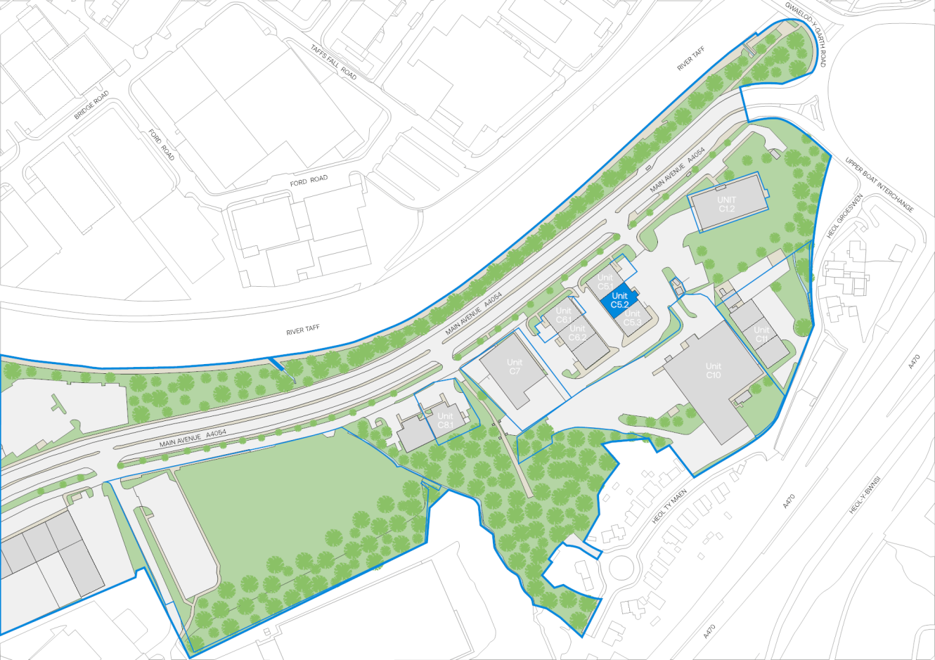 Site map showing buildings, roads, car parks, and green spaces bordered by a blue outline, with labelled structures and tree symbols indicating landscaped areas.