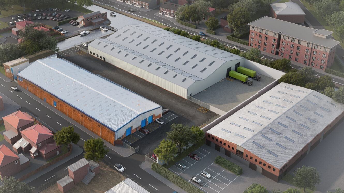 Aerial view of an industrial complex featuring three large warehouse buildings, surrounding car parks, clusters of trees, and a nearby residential block of flats.