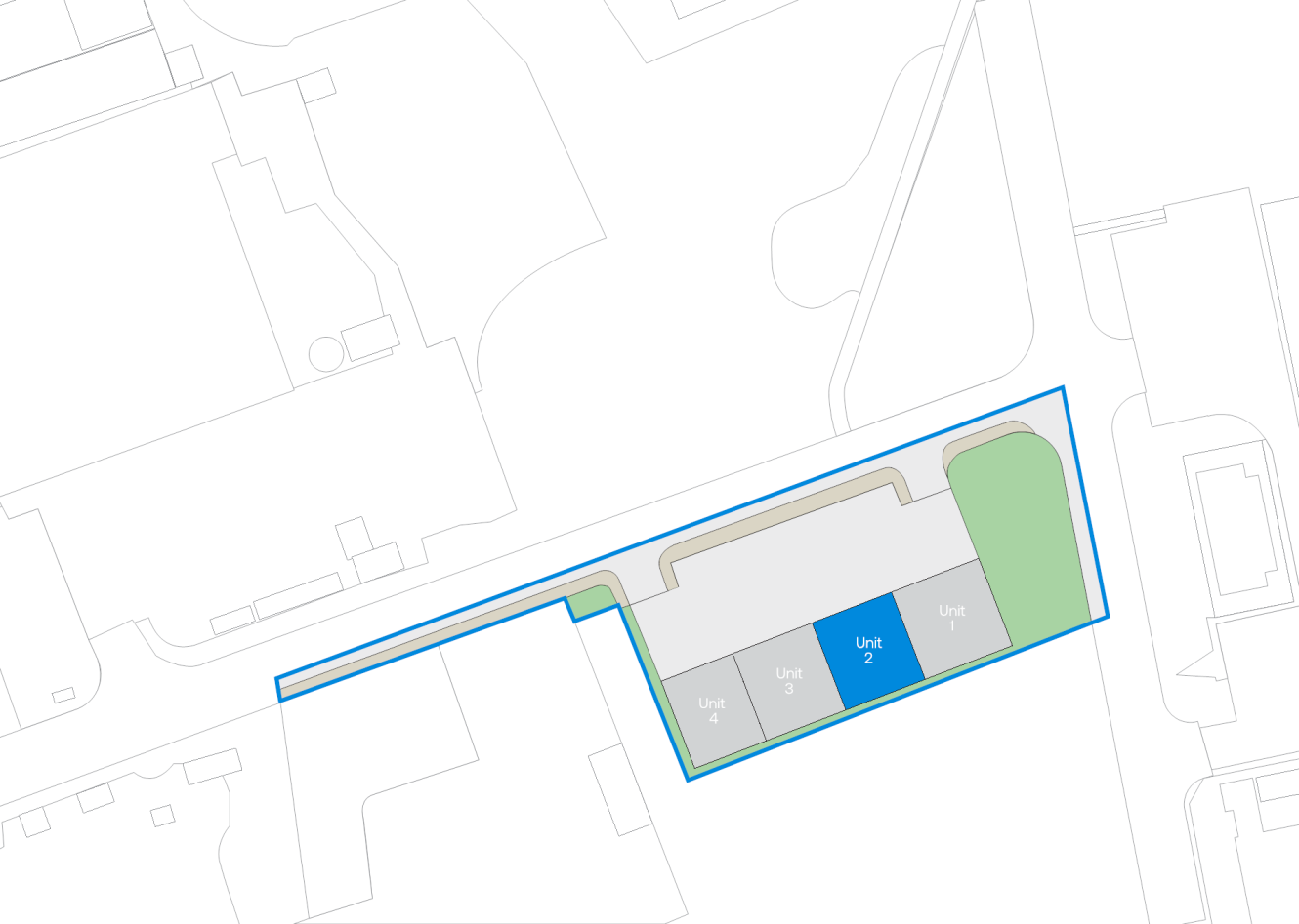 Site plan map with four units, where Unit 1 and Unit 2 are shaded blue. Buildings, streets, and green spaces around the units are outlined in grey and green.