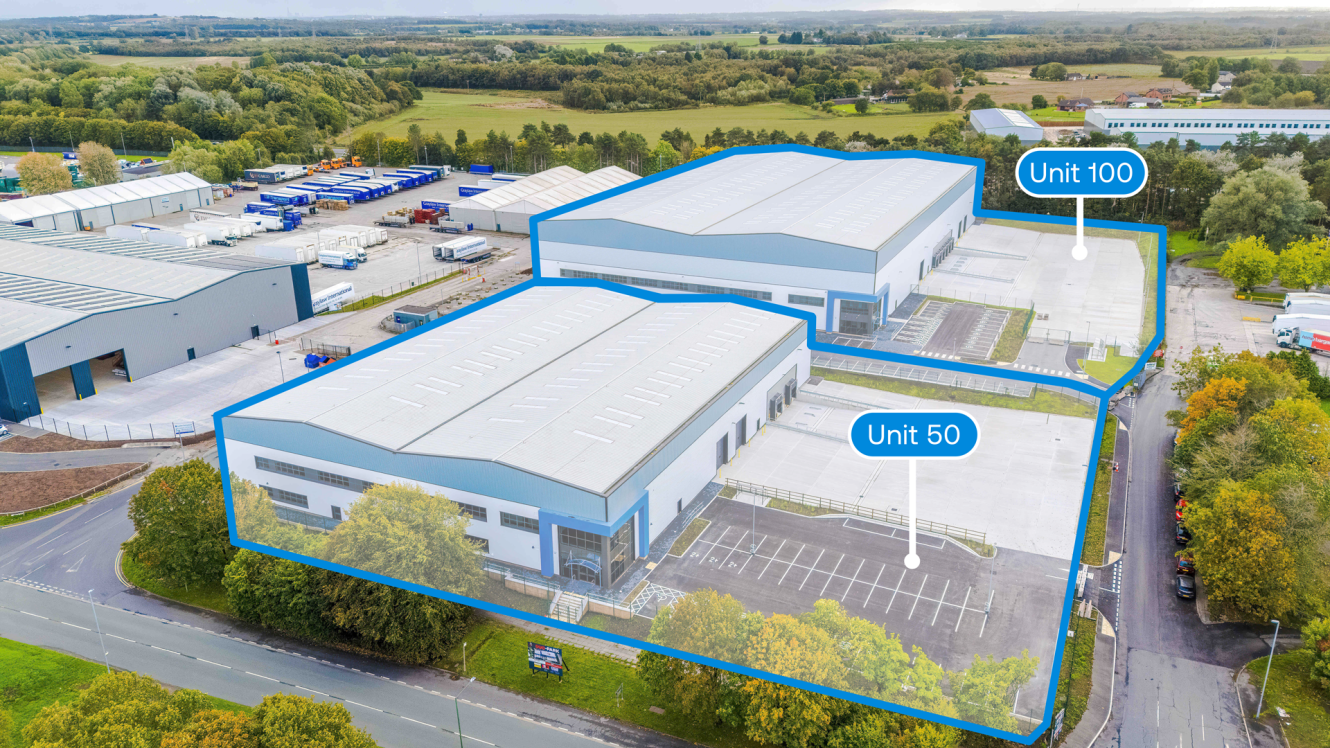 Aerial view of an industrial estate highlighting two warehouse buildings labelled Unit 50 and Unit 100 with outlined boundaries and adjacent car parks.
