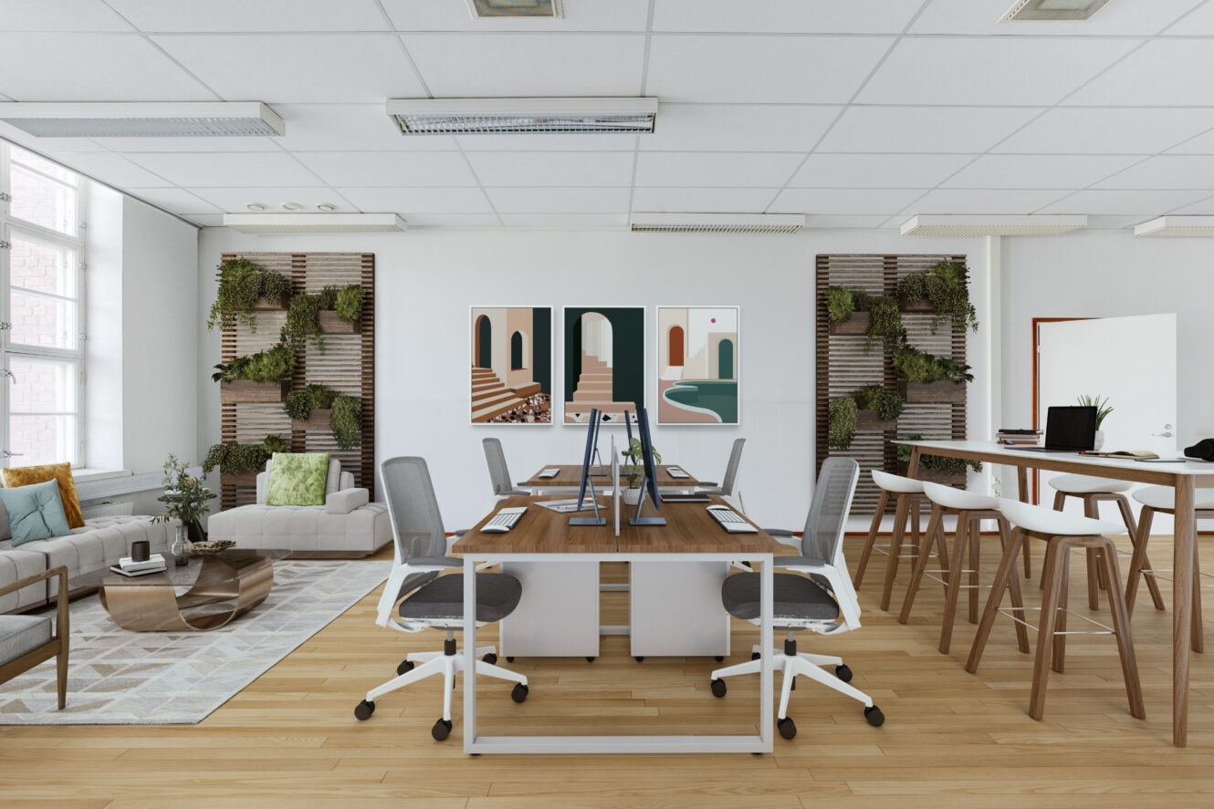 Moderni avotoimisto, jossa on jaetut työpöydät, ergonomiset tuolit, seinätaidetta, viherkasveja, sohva-istuinalue ja suuret ikkunat, joista pääsee luonnonvaloa.