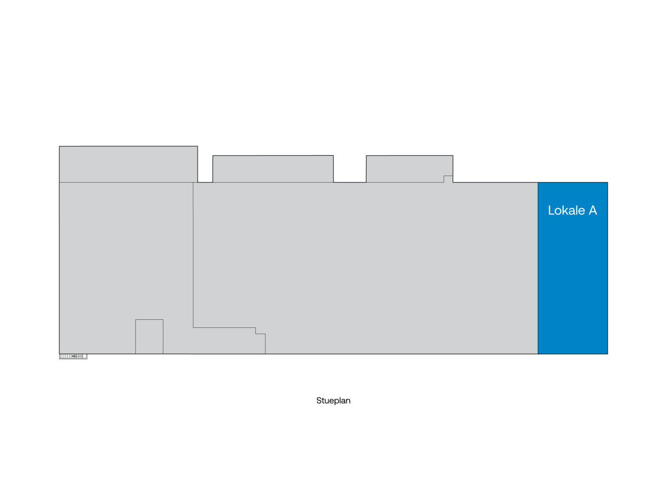 Plantegning med Lokale A markeret med blåt yderst til højre i en overvejende grå bygningsplan.