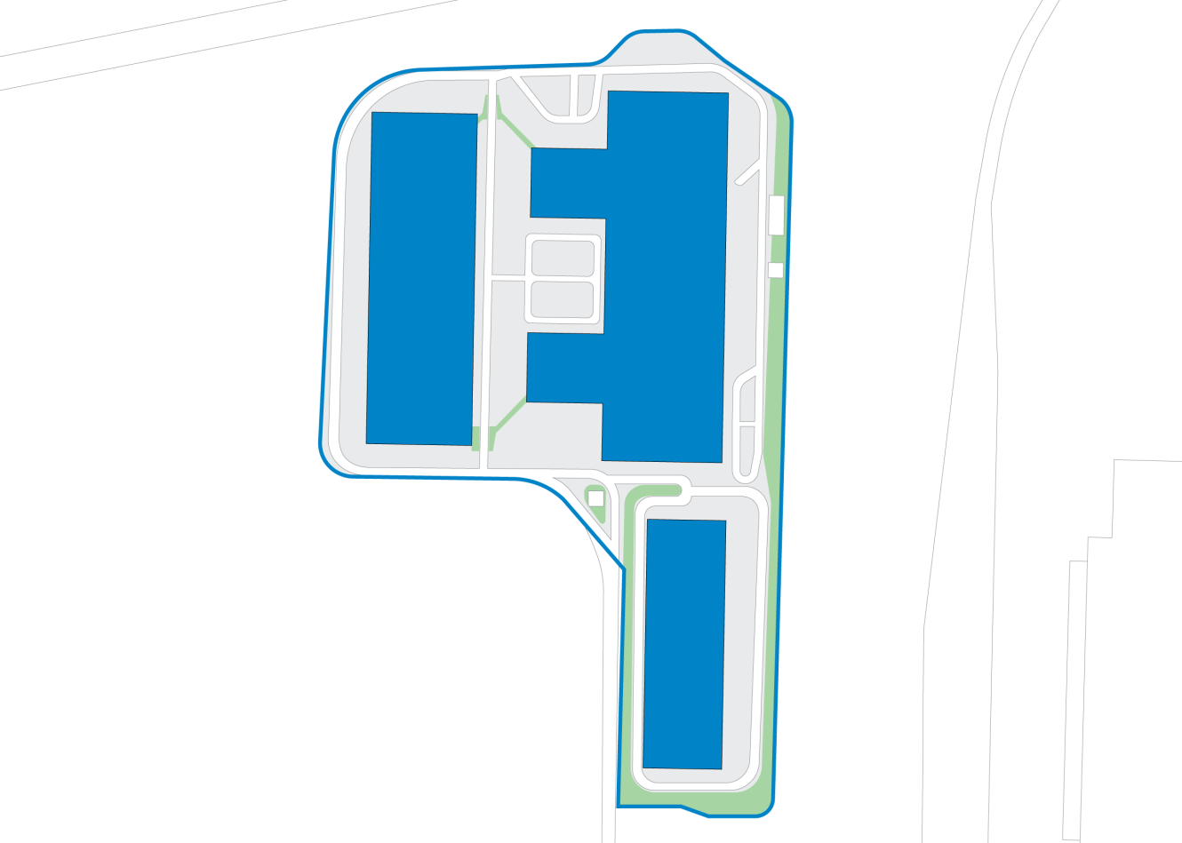 Et simpelt kort, der viser flere rektangulære blå bygninger placeret omkring veje og stier inden for en afgrænset ejendom.