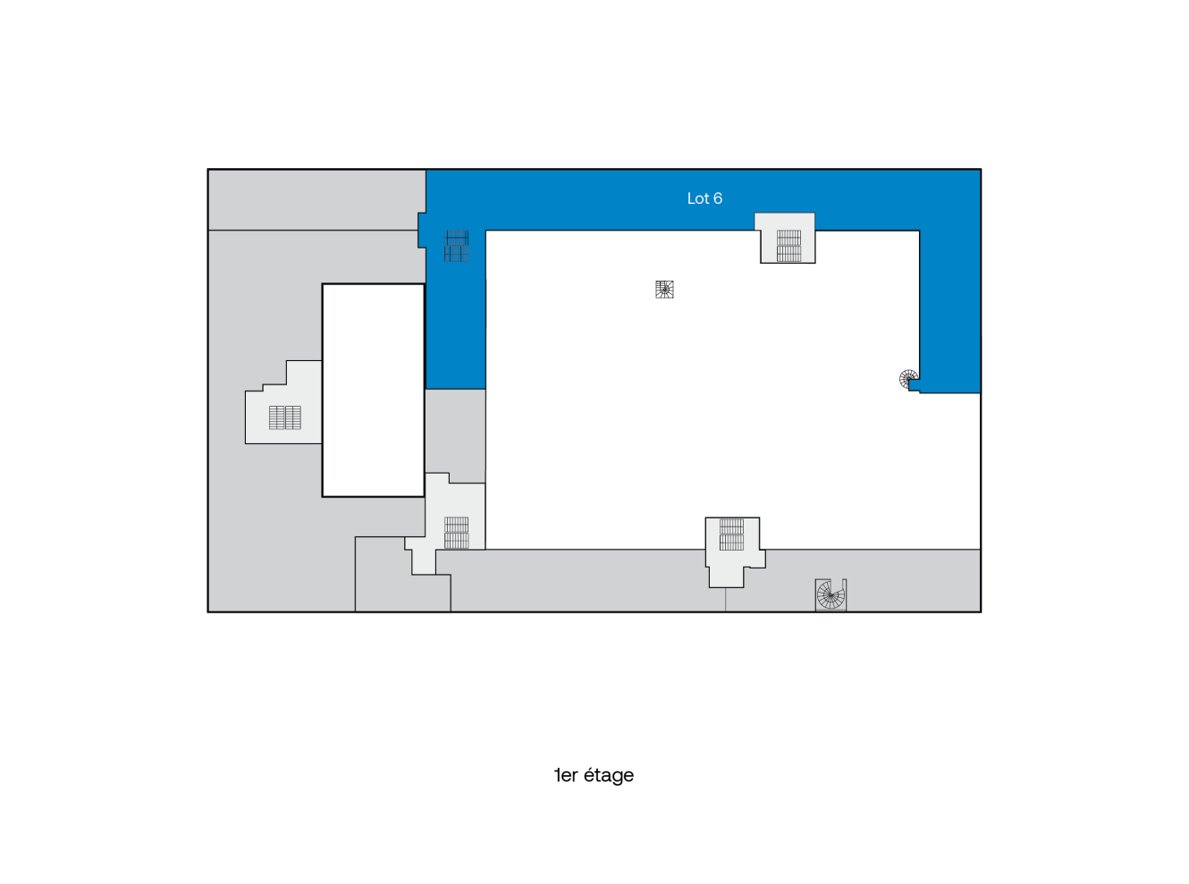Plan du premier étage avec une zone étiquetée Lot 6 surlignée en bleu, occupant la partie supérieure du plan.