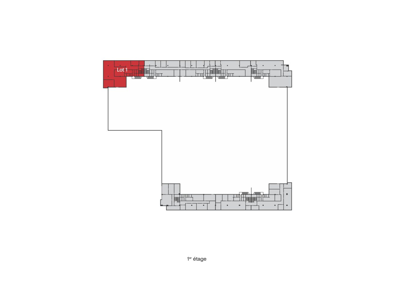 Un plan d'étage avec une section surlignée en rouge étiquetée Lot 1 dans le coin supérieur gauche ; le reste de l'étage est gris.