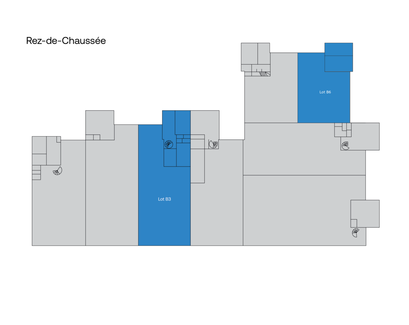 Plan d'étage intitulé « Rez-de-Chaussée », sur lequel les lots 83 et 84 sont mis en évidence en bleu parmi des pièces grises et des petites icônes représentant des escaliers.