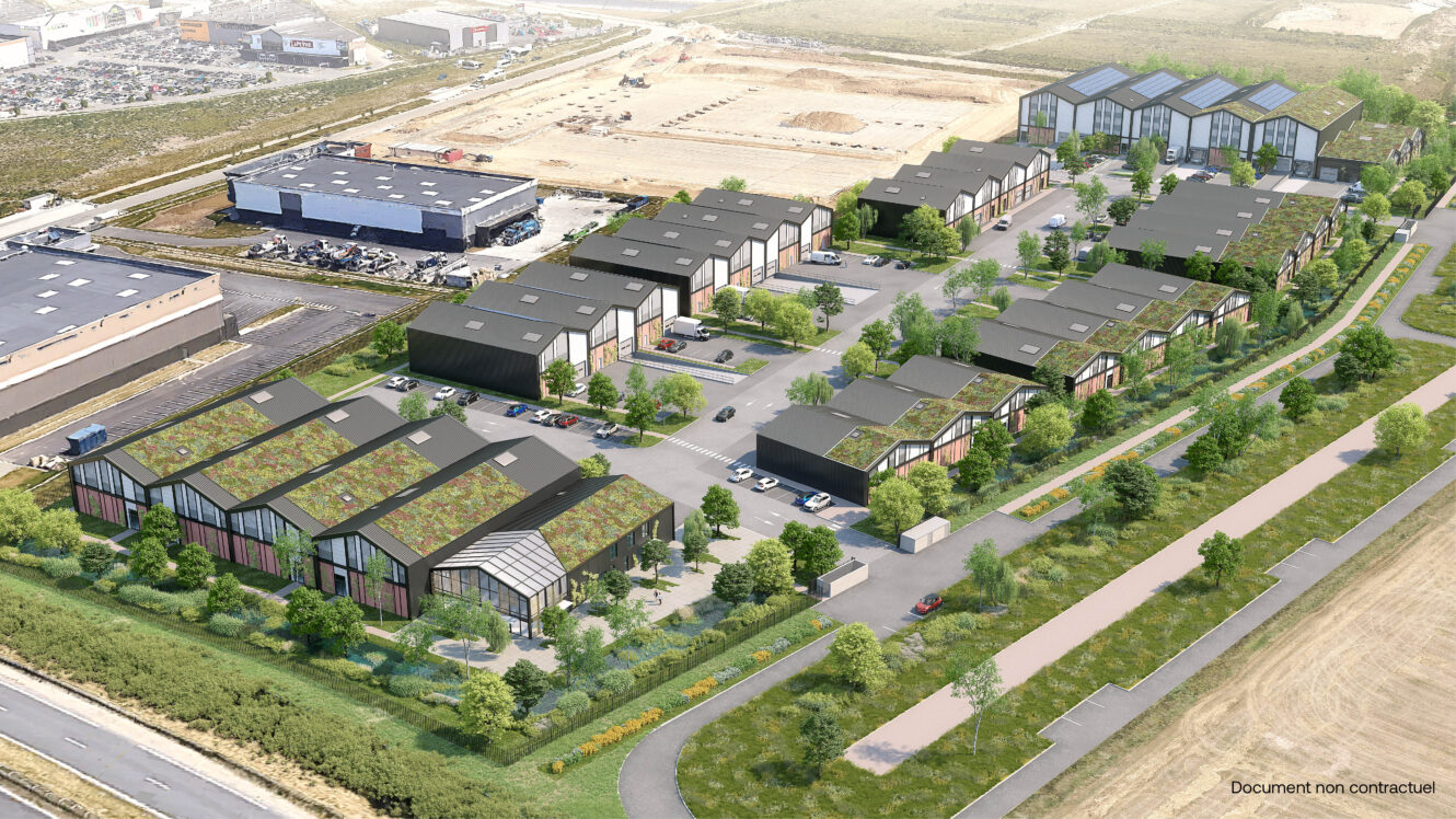 Rendu aérien d'un complexe industriel et de bureaux moderne comprenant plusieurs bâtiments, des toits verts, des aires de stationnement et des aménagements paysagers.