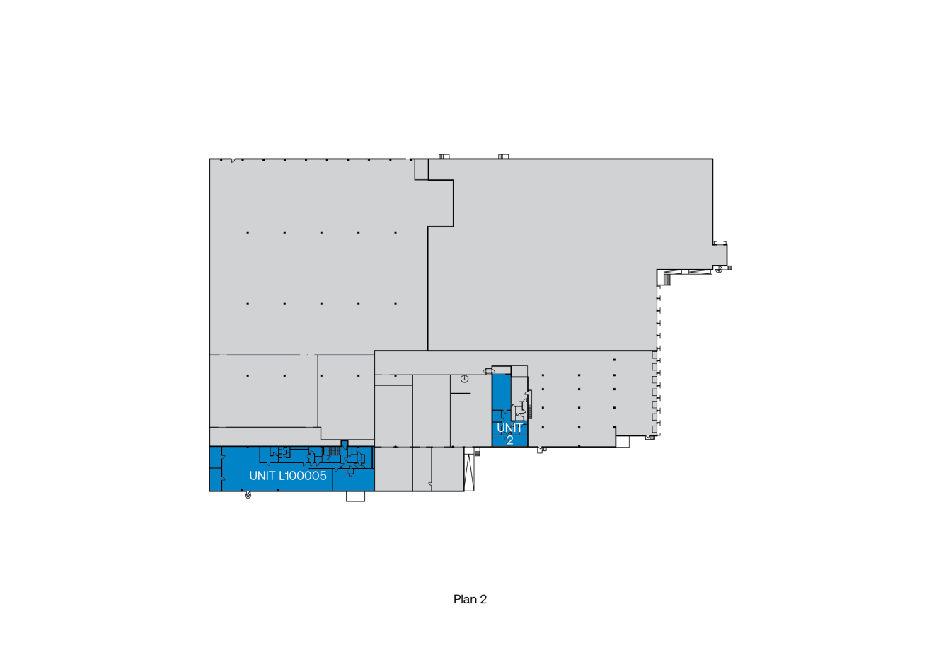 En planritning märkt Plan 2 som visar skisserade områden, med två sektioner markerade i blått och märkta UNIT L000005 och UNIT.