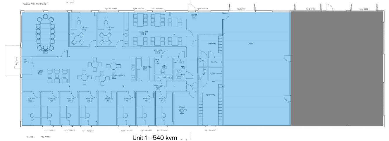 Planritning märkt Unit 1 - 540 kvm, som visar kontorsytor, mötesrum, kök, toaletter, entré och ett stort lagerutrymme till höger.