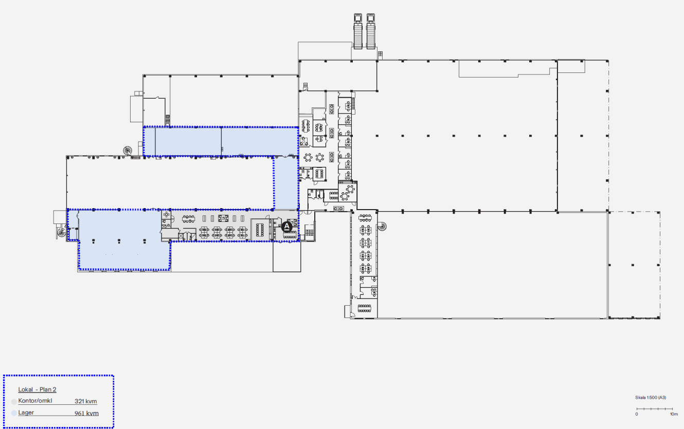 Planritning över en byggnad som visar kontors- och lagerytor, med vissa delar markerade med blått; kontorsyta: 521 kvm, lageryta: 963 kvm.