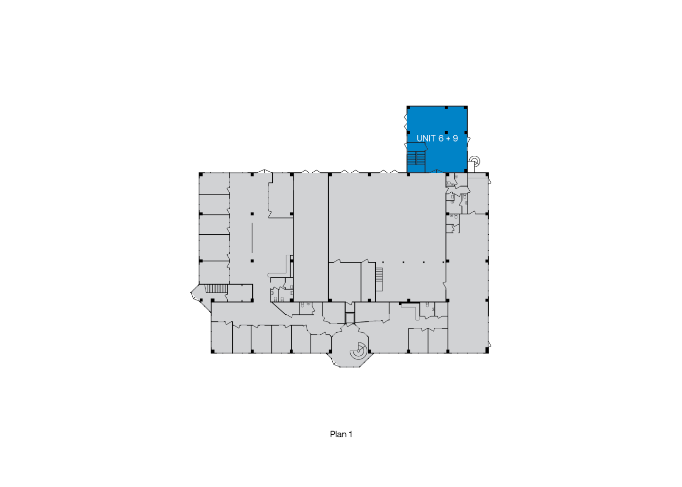 Planritning som markerar Unit 6-9 i blått i det övre högra hörnet av byggnadens layout. Resten av byggnaden visas i grått.