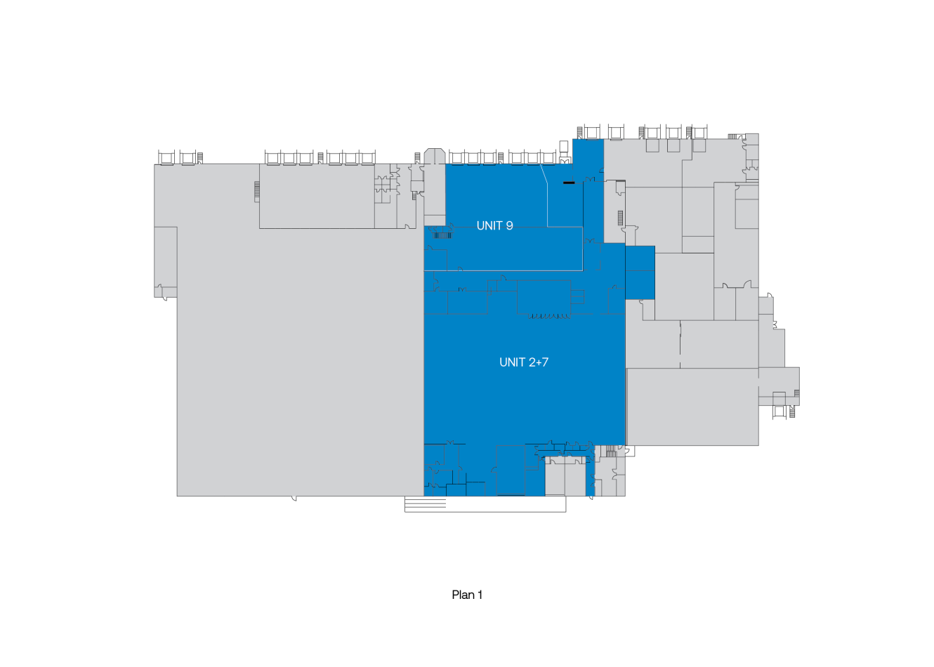 Planritning med två markerade områden märkta UNIT 9 och UNIT 2-7 i blått, vilket indikerar deras placering i en större byggnadslayout.